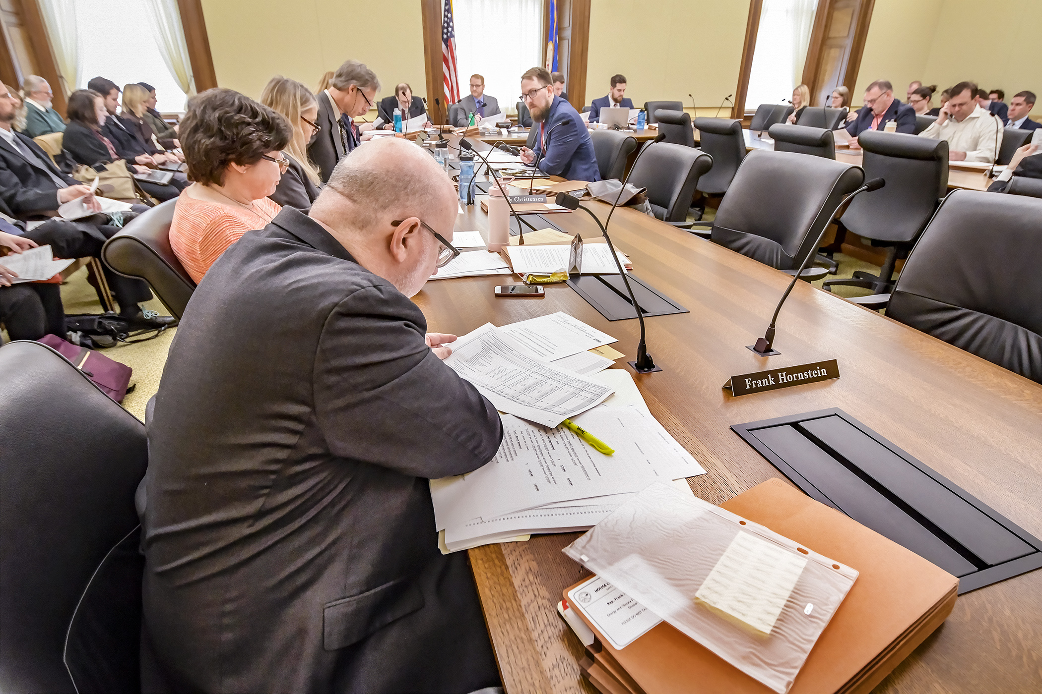 The House Energy and Climate Finance and Policy Division listens to a nonpartisan staff walk-through of its omnibus finance bill April 2. Photo by Andrew VonBank